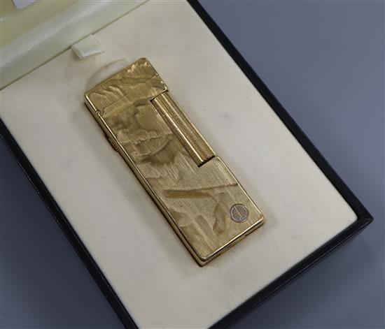 A Dunhill gold plated rollagas lighter